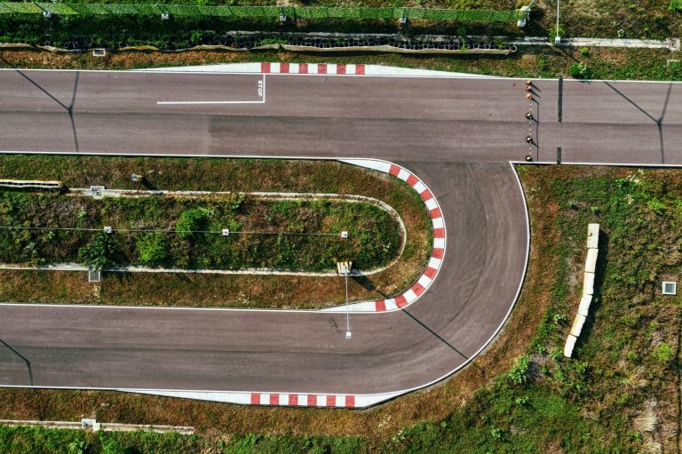 racetrack viewed from above with grandstand visible