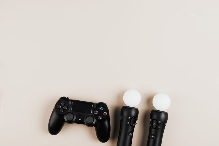 Crash Arcade Platform Debuts with 32 Games from Big Run Studios 1 Black gaming controllers arranged on a light background with ample copy space