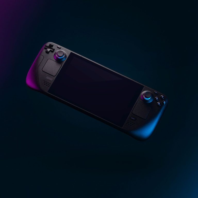 Elegant handheld gaming device with colorful backlighting against a dark backdrop
